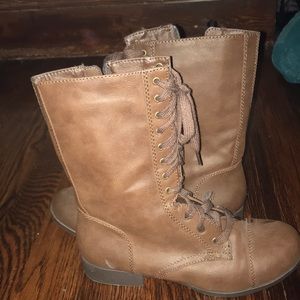 Brown laced up zipper on the side combat boots